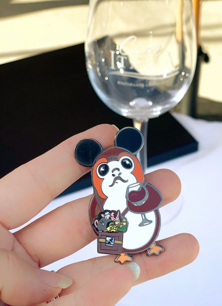 Porg drinking Wine with a Ratatouille Bag Pin